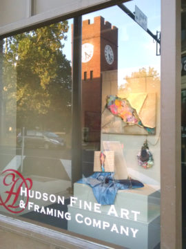 Hudson Fine Art and Framing window with clocktower