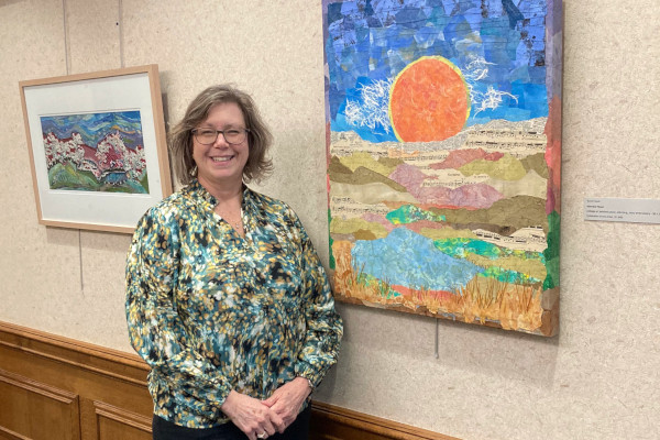 Artist with collage art at Judson Manor, Cleveland